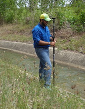 2017 Fellow Felix Santiago-Collazo conducts research by water